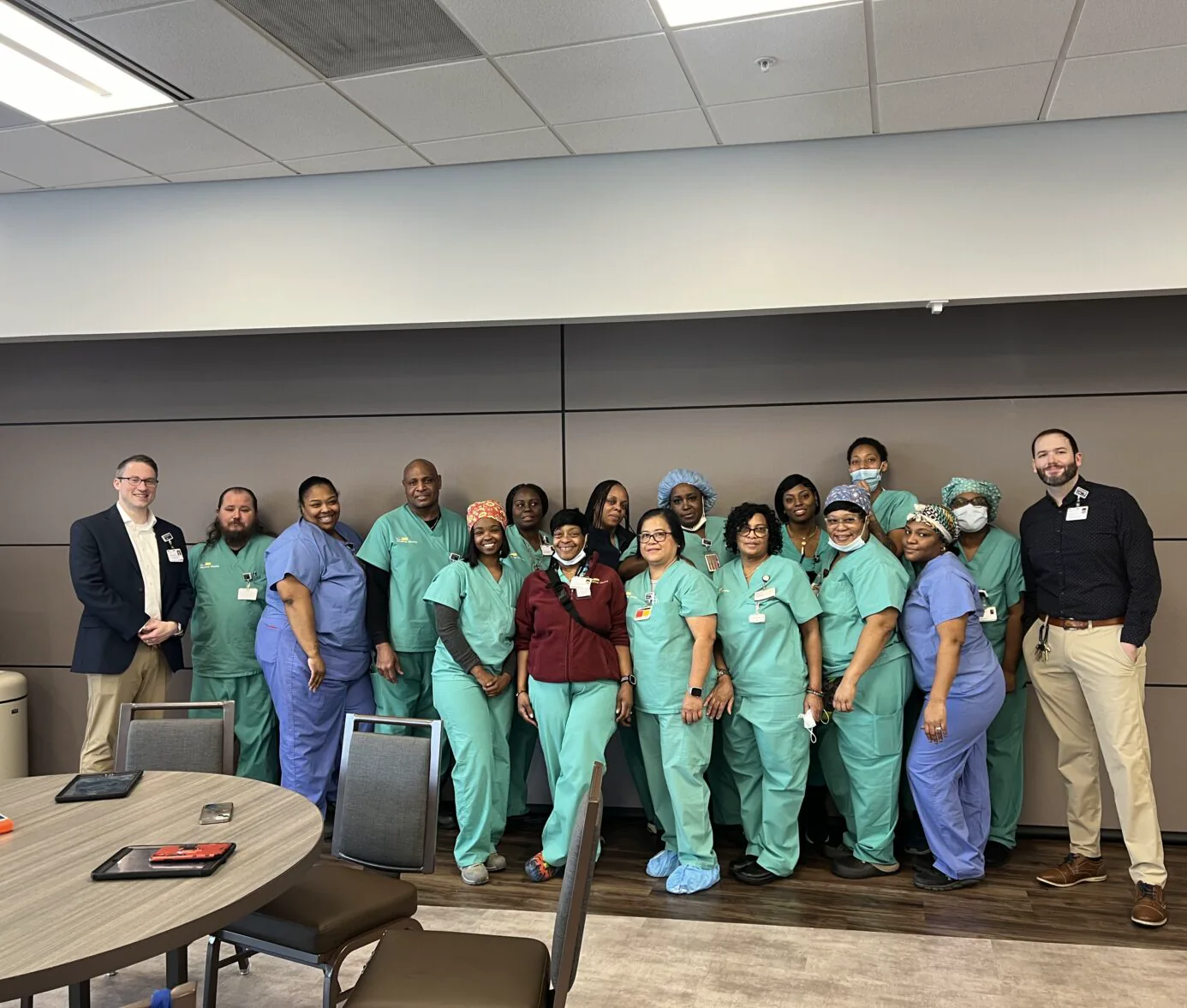 Healthcare environmental services team in a clinical setting